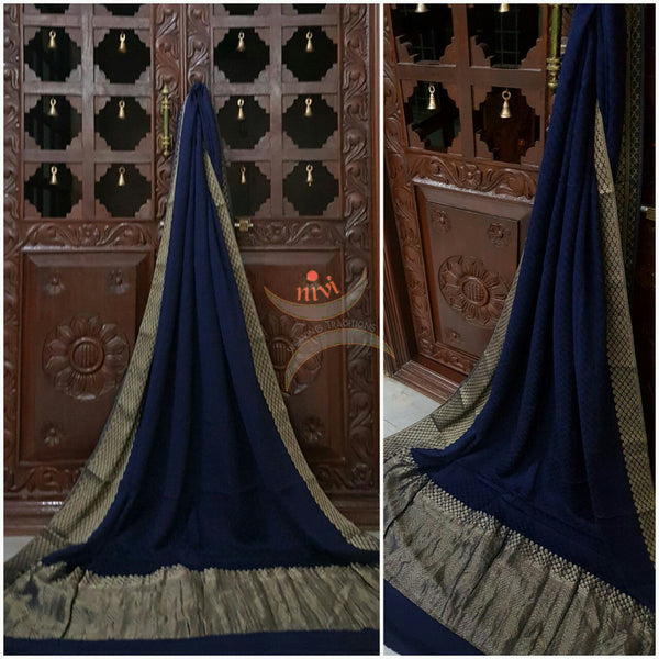 Royal blue 70 gram pure crepe silk with zari border and pallu