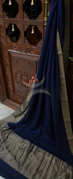 Royal blue 70 gram pure crepe silk with zari border and pallu