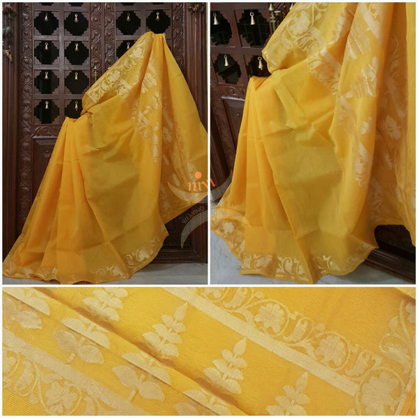 Yellow Silk cotton kota Doria woven saree with floral motif.