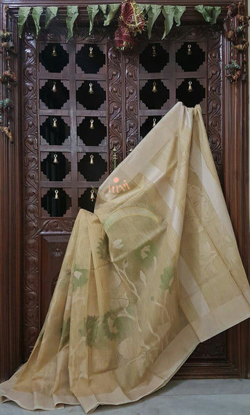 Cream silk cotton woven saree with allover floral motif