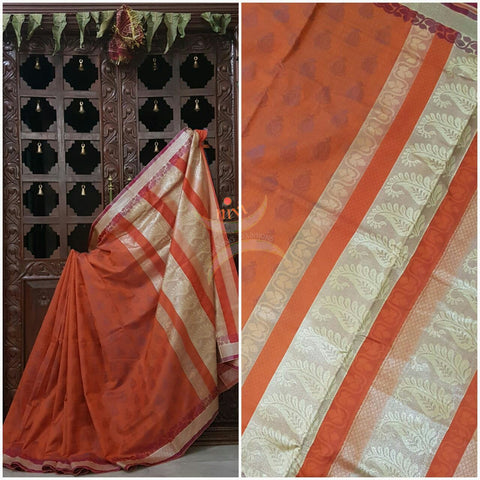 Peach Mercerized Kota Cotton with brocade Weaving.