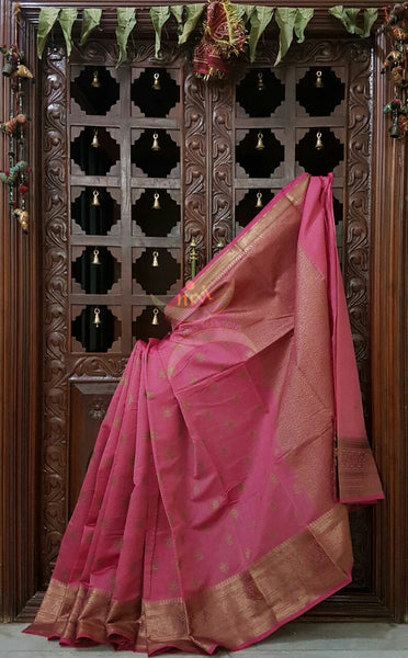 Pink Linen Cotton Benaras Brocade with antique zari weaving all over.
