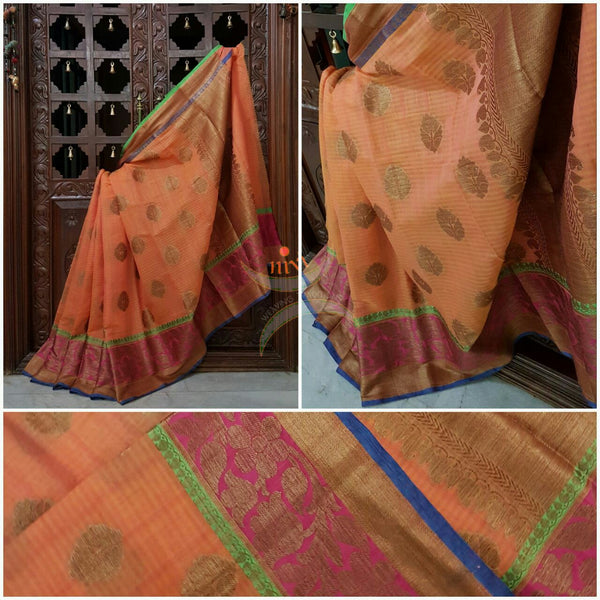 Orange Linen Cotton Benaras Brocade saree with antique zari weaving all over the saree.