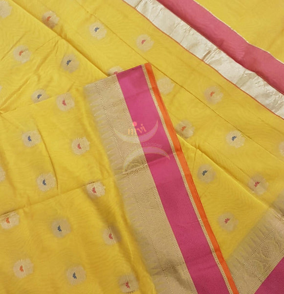 Yellow silk cotton benaras brocade saree with satin finish contrasting pallu and border and antique gold zari woven on border