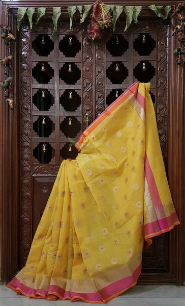 Yellow silk cotton benaras brocade saree with satin finish contrasting pallu and border and antique gold zari woven on border