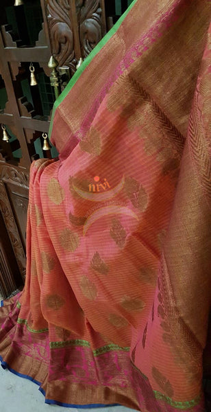 Peachish pink Linen Cotton Benaras Brocade saree with antique zari weaving all over the saree.