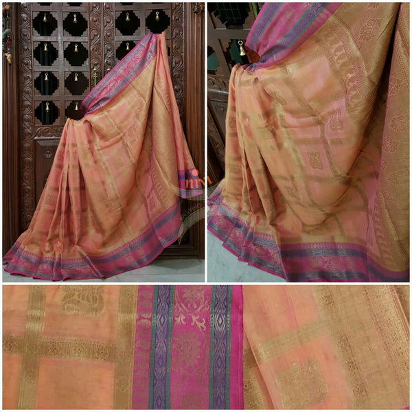 Peach Linen Cotton Benaras Brocade saree with antique zari weaving all over the saree.