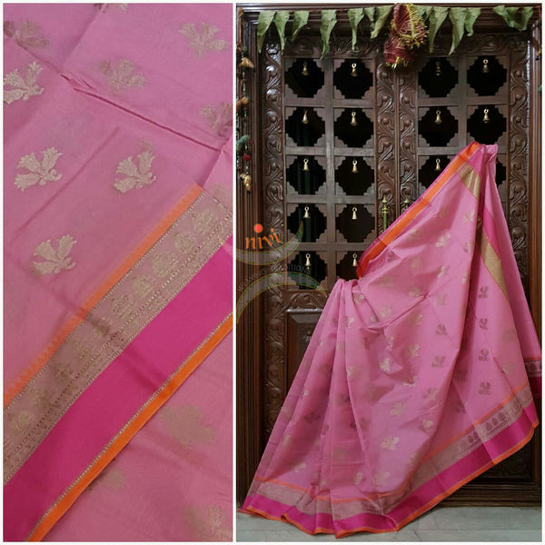 Pink silk cotton benaras brocade saree with satin finish contrasting pallu and border and antique gold zari woven on border and booties allover.