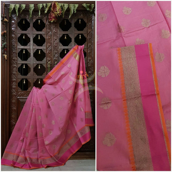 Pink silk cotton benaras brocade saree with satin finish contrasting pallu and border and antique gold zari woven on border and booties all over
