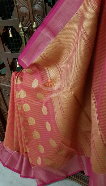 Maroon red Linen Cotton Benaras Brocade saree with antique zari weaving all over the saree.