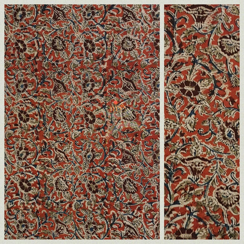 Red handwoven cotton kalamkari material with floral motifs.