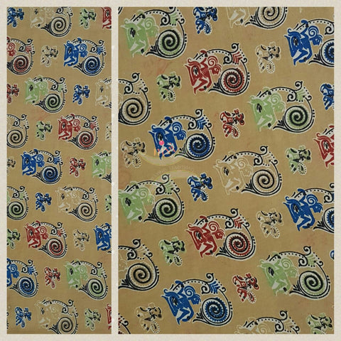 Lemon yellow handwoven cotton kalamkari material with human and animal motifs.