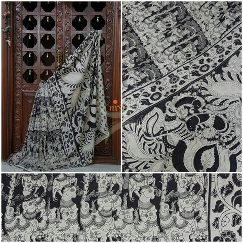 Black and white chennur silk kalamkari with intricate peacock, gowmata  and floral motif on pallu and on border.