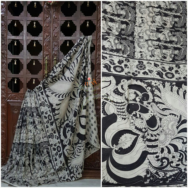 Black and white chennur silk kalamkari with intricate peacock, gowmata  and floral motif on pallu and on border.