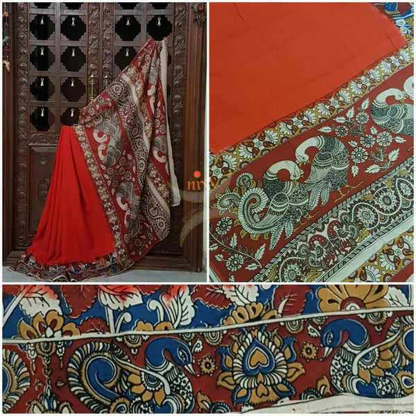 Red chennur silk kalamkari with intricate peacock motif and floral on pallu and on border.