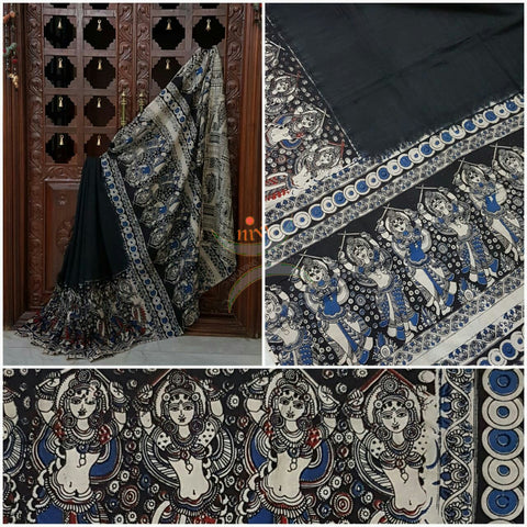 Black chennur silk kalamkari with intricate dancing figure motif on pallu and on border.