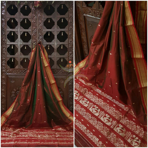 Brown silk Paithani with traditional peocock motif comes with contrasting red border and pallu.