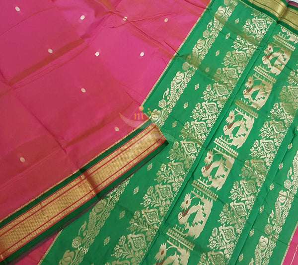 Pink silk Paithani with traditional peocock motif comes with contrasting green border and pallu.
