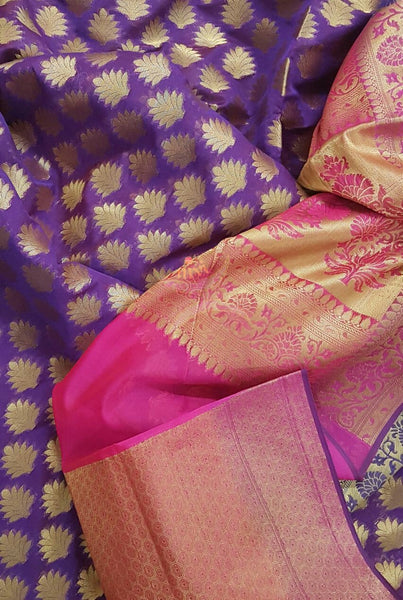 Purple Silk Cotton Benaras with traditional Brocade weaving all over the saree with contrasting pink pallu.