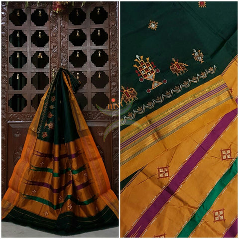 Bottle green with mustard silk cotton kasuti embroidered Ilkal with Anne ambari motif and traditional tope teni pallu . 
