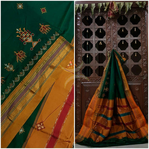 Green with mustard silk cotton kasuti embroidered Ilkal with Anne ambari motif and traditional tope teni pallu . 