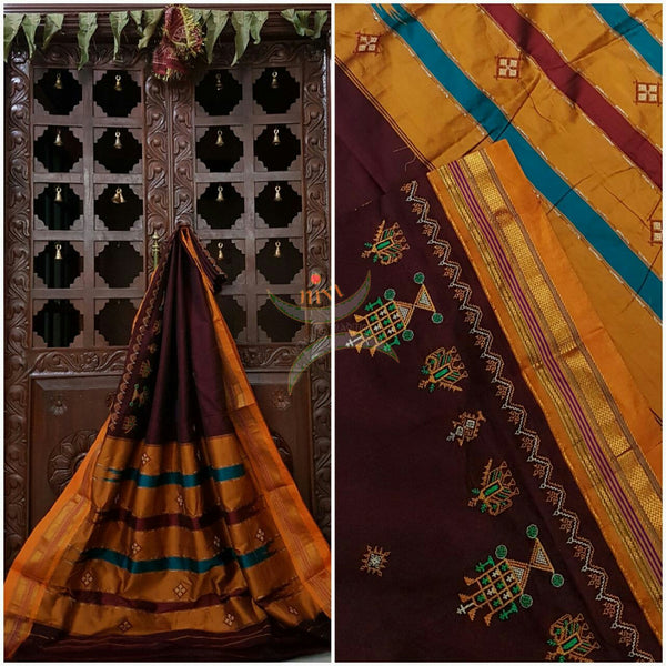 Maroon with mustard silk cotton kasuti embroidered Ilkal with Anne ambari motif and traditional tope teni pallu . 
