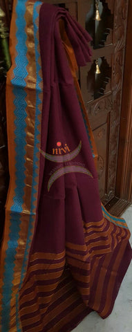 Cotton sarees with woven zari border and striped pallu.