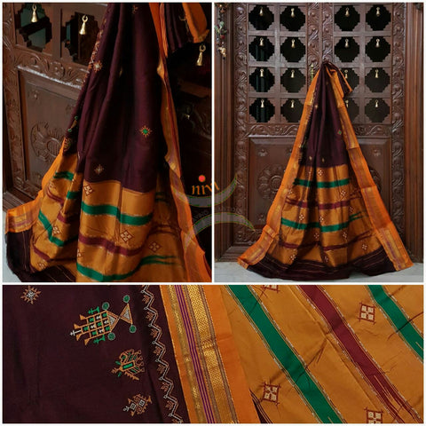 Maroon with mustard silk cotton kasuti embroidered Ilkal with Anne ambari motif and traditional tope teni pallu . 