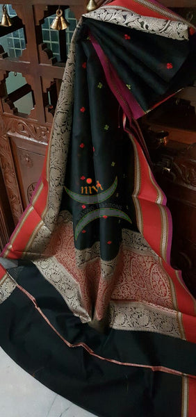 Black silk cotton brocade saree with satin finish contrasting border and embroidery allover with woven rich pallu.