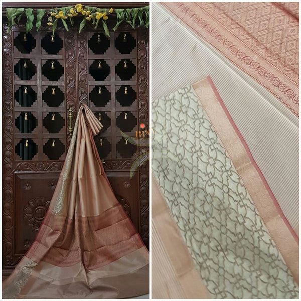 Peach Silk Cotton woven Brocade saree with contrast border and pallu.