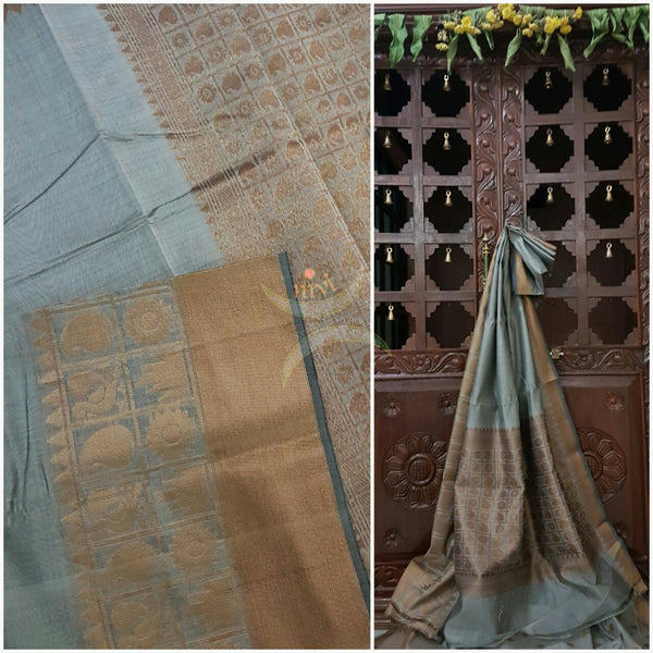 Grey silk cotton benaras brocade saree with antique gold zari woven border and pallu.
