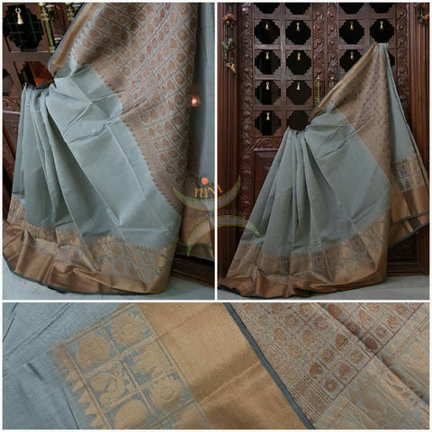 Grey silk cotton benaras brocade saree with antique gold zari woven border and pallu.