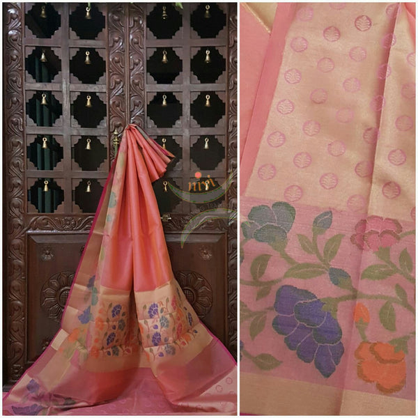 Pink silk cotton Brocade with woven floral motifs on border and pallu.