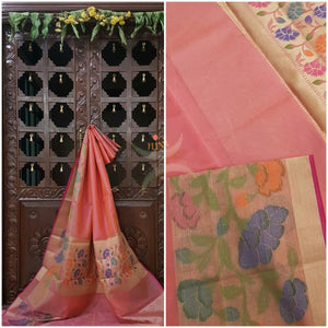 Pink silk cotton Brocade with woven floral motifs on border and pallu.