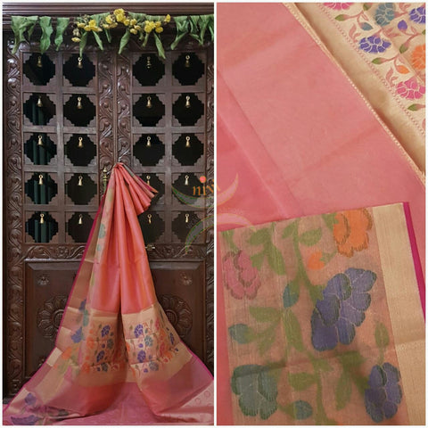 Pink silk cotton Brocade with woven floral motifs on border and pallu.