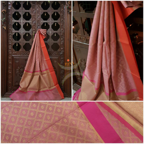 Soft Pink silk cotton benaras brocade saree with satin finish contrasting pink orange border and antique woven gold zari all over the saree.