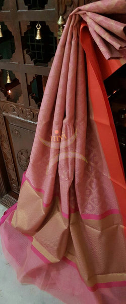 Soft Pink silk cotton benaras brocade saree with satin finish contrasting pink orange border and antique woven gold zari all over the saree.