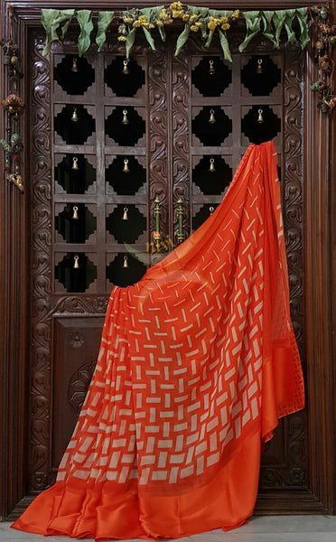Orange wrinkle printed crepe with satin finish and Abstract Geometrical print.