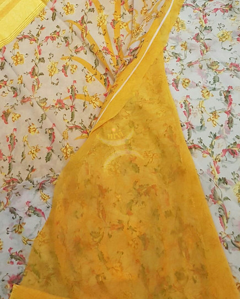 Yellow wrinkle printed Georgette with satin finish border and floral print.