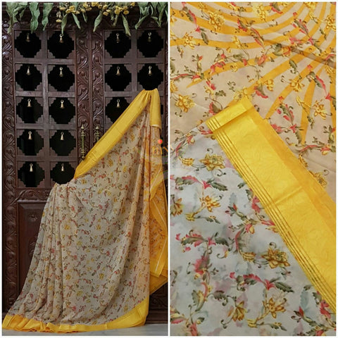 Yellow wrinkle printed Georgette with satin finish border and floral print.