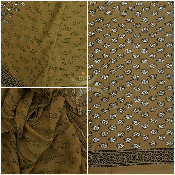 Handloom Mehendi green hand block printed dress material with Paisley motif. Dress comes with block printed chiffon dupatta.