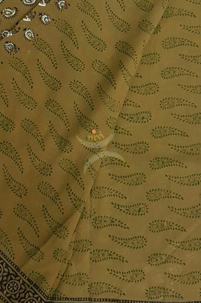 Handloom Mehendi green hand block printed dress material with Paisley motif. Dress comes with block printed chiffon dupatta.