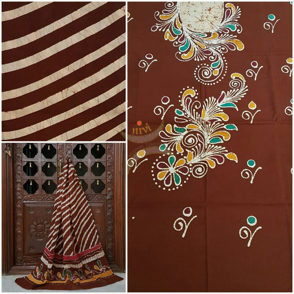 Brown with Off White Handloom Mul Cotton Batik printed dress material with floral motif for top and diagonal lines for duppata and bottom.