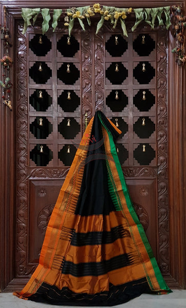 Black silk cotton Gadwal with contrasting Ganga Jamuna border of mustard and green and traditional tope teni border