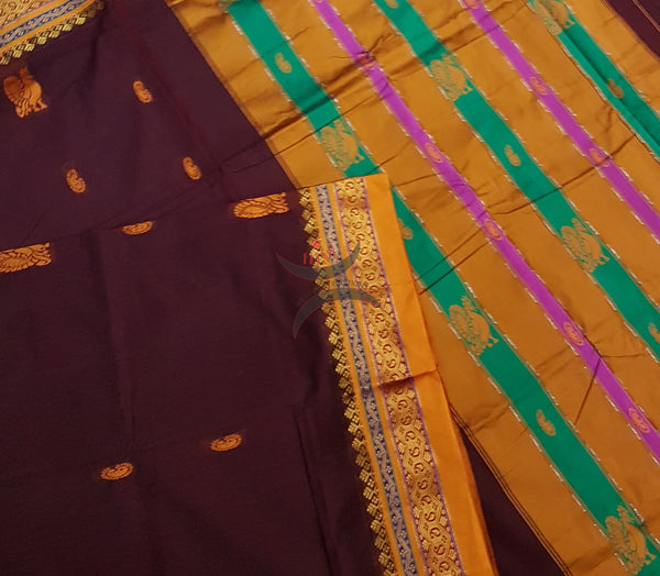 Maroon with mustard sico traditional South saree with peacock and paisley motif allover the saree, border and pallu. Saree comes with running blouse.
