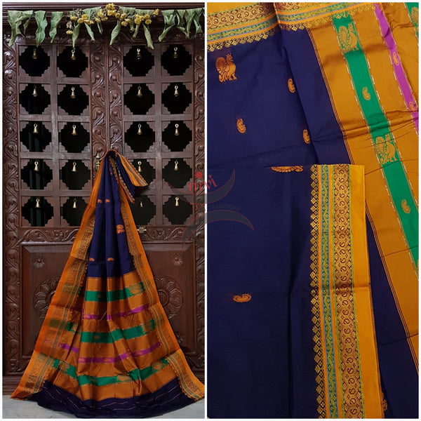 Royal blue with mustard sico traditional South saree with peacock and paisley motif allover the saree, border and pallu. Saree comes with running blouse.