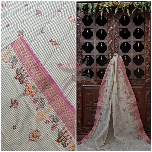 Off white with subtle grey chequered kota cotton with pink border and Kasuti embroidery with Traditional anne gopura peacock and lamp motifs.