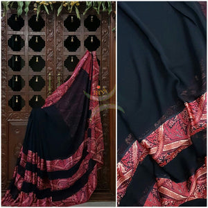 Black Printed Crepe Georgette with satin finish and floral print.