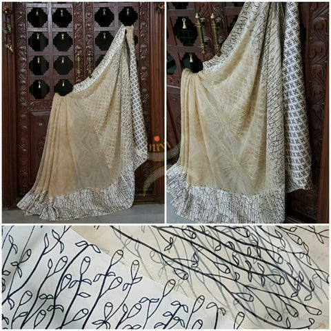 Off white Printed Crepe Georgette with satin finish and floral print.