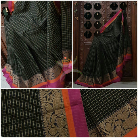 Black Silk Cotton chequered saree with satin finish contrasting pink orange border and woven musical instruments at border with antique gold zari. Saree comes with running blouse.